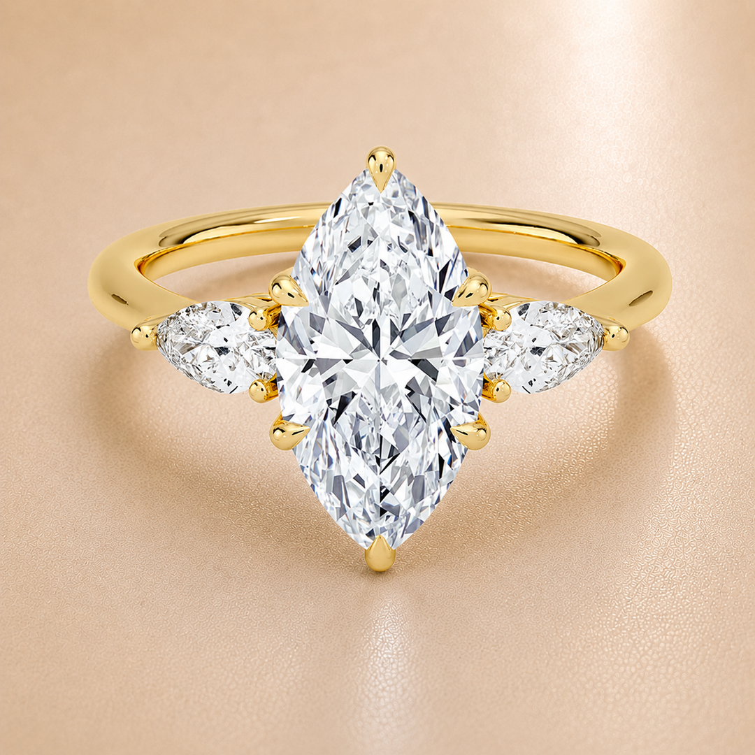Pear Triology Marquise Engagement Ring in Yellow Gold