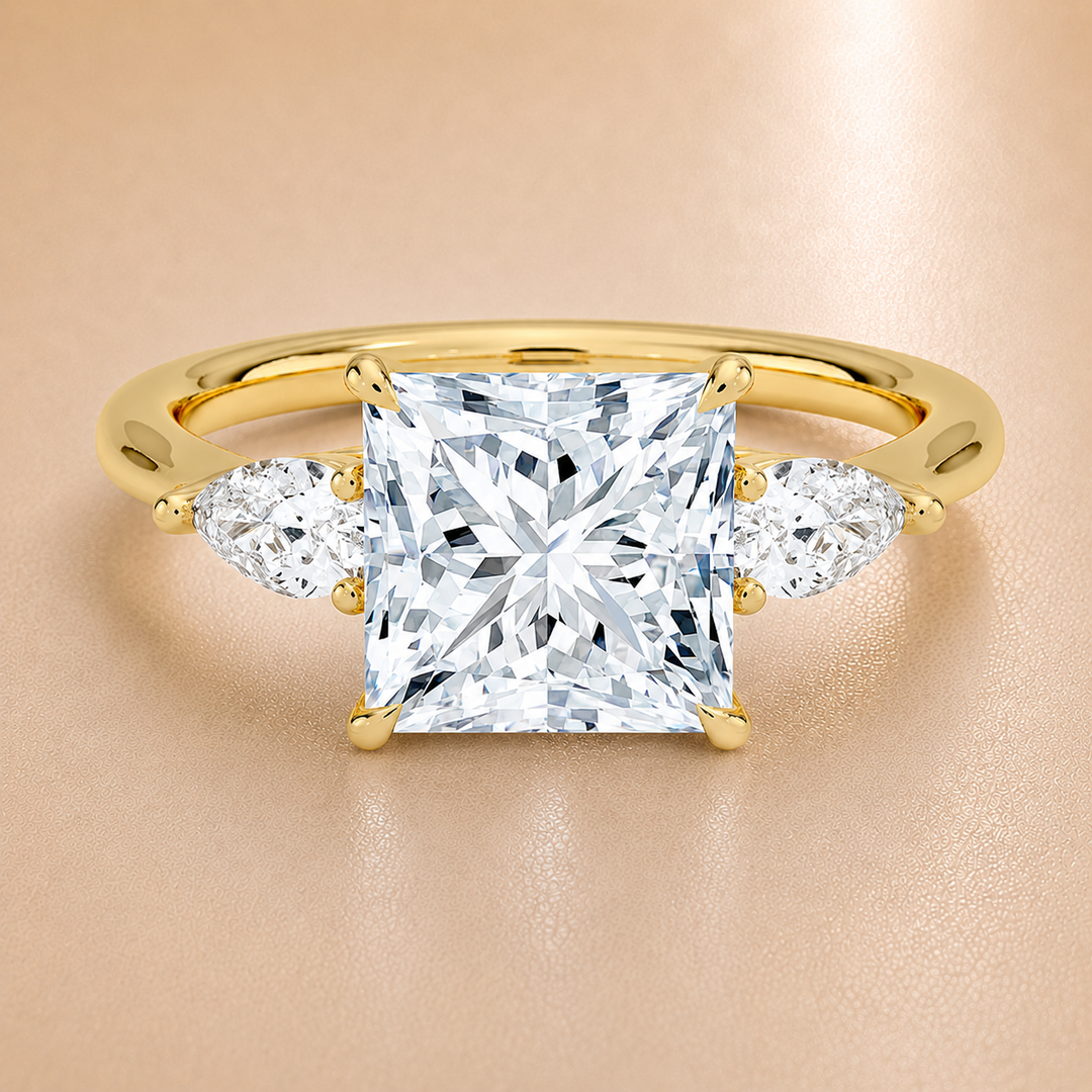 Pear Triology Princess Engagement Ring in Yellow gold