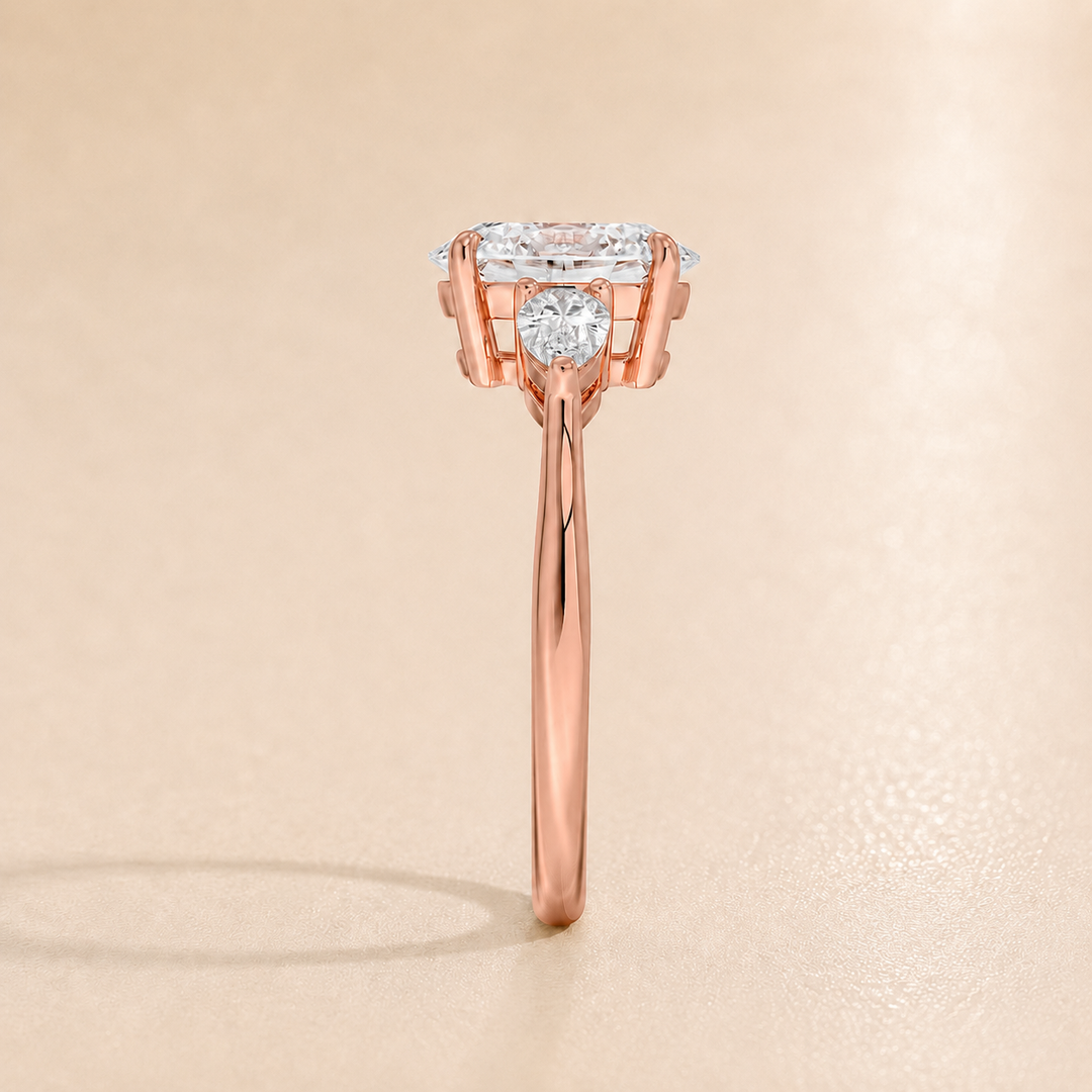 Pear Triology Oval Engagement Ring in Rose Gold