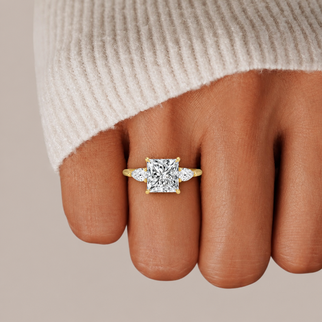 Pear Triology Princess Engagement Ring in Yellow gold