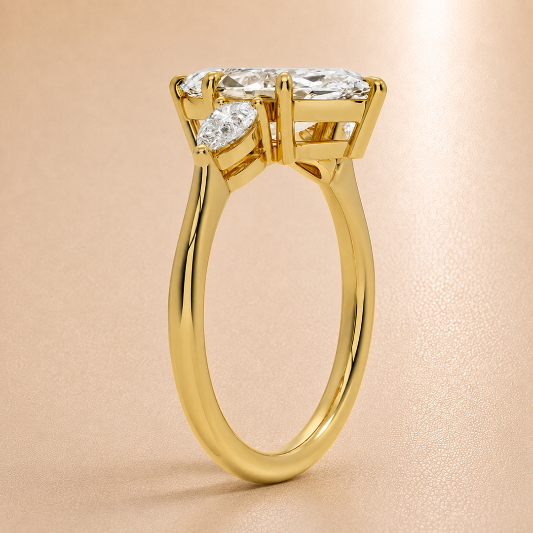 Pear Triology Marquise Engagement Ring in Yellow Gold