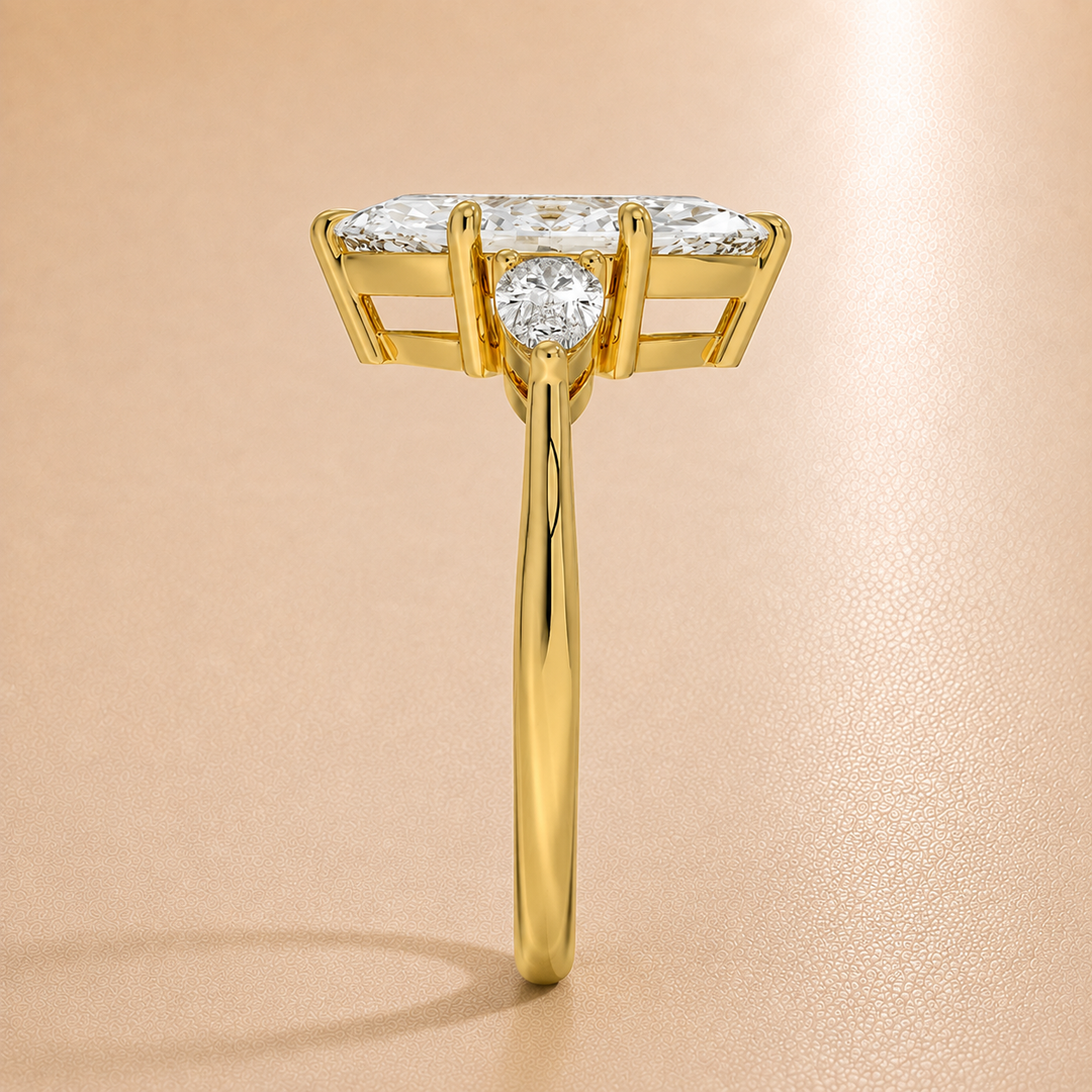Pear Triology Marquise Engagement Ring in Yellow Gold